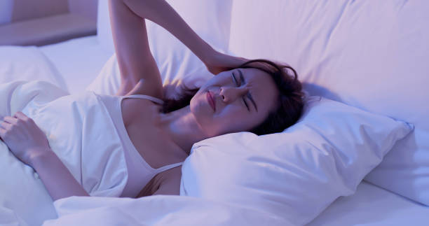 istock woman insomnia on bed 1178101277
