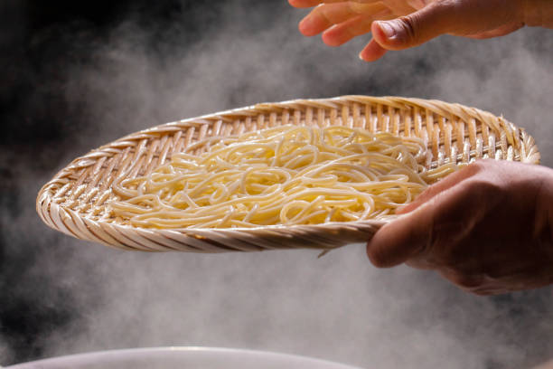 istock Bamboo raft, cauldron, hot, noodle, appetite 1178110744