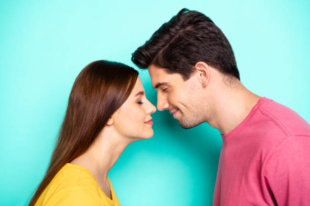 istock Close-up profile side view portrait of his he her she nice attractive dreamy affectionate cheerful cheery couple cuddling isolated over bright vivid shine vibrant green turquoise background 1178113950