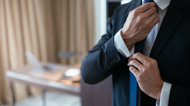 istock Businessman fixing his tie 1178114068