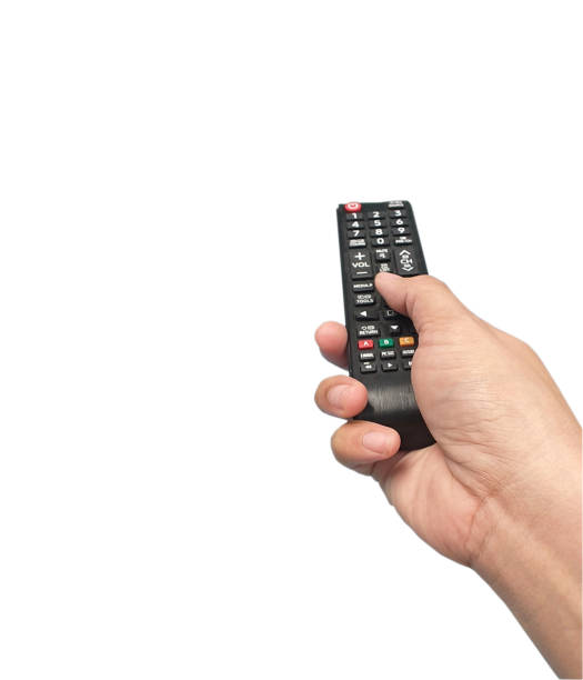 istock Hand holding television and audio remote control isolate on white background 1178114694