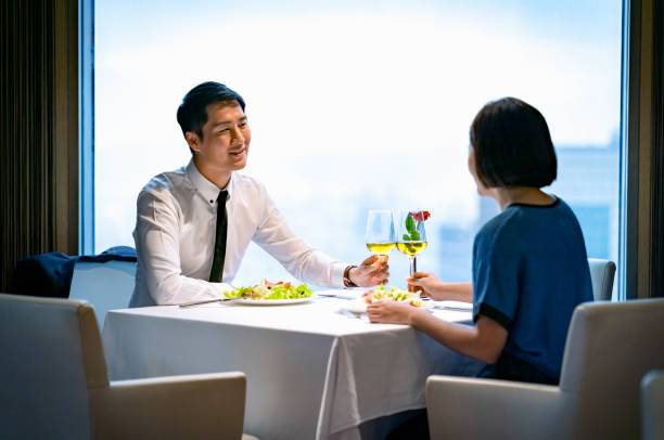 istock Business partners toasting wine at restaurant 1178117297