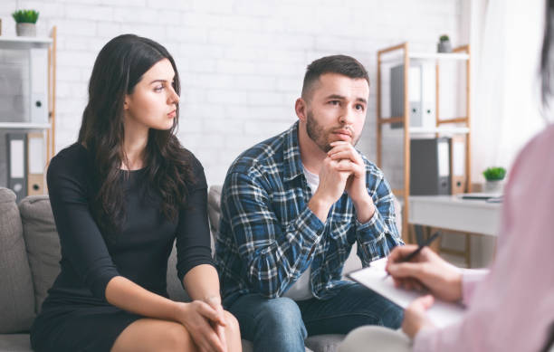 istock Serious man talking to psychiatrist during marital therapy session 1178120169