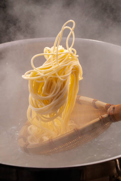 istock Bamboo raft, cauldron, hot, noodle, appetite 1178122680