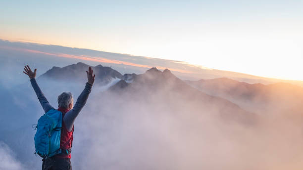 istock Hiker On Top Of The Mountain 1178122900