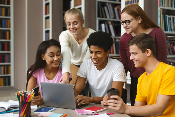 istock Group of international classmates checking on new project 1178124474