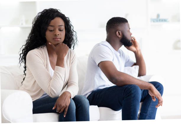 istock Couple Sitting On Different Sides Of Couch After Quarrel 1178125201