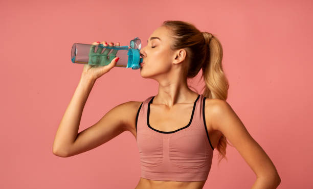 istock Fit Girl Drinking Water During Workout, Studio Shot 1178127038
