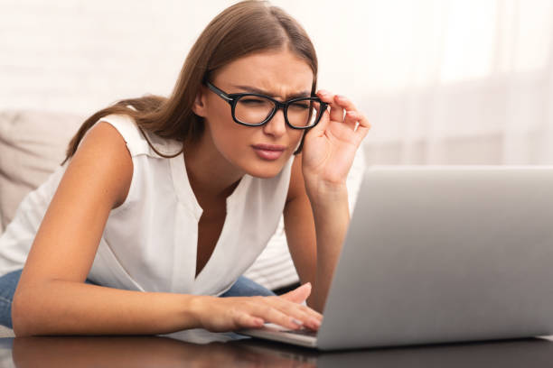 istock Girl Looking At Laptop Having Eyesight Problem At Home 1178129056