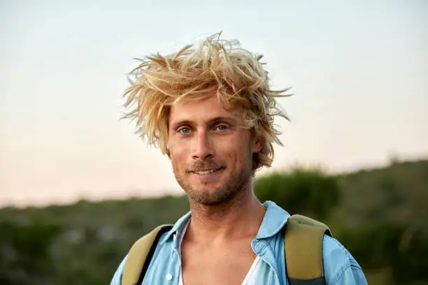 Photo of Close-up of hiker with messy hair
