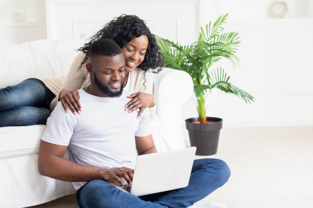 istock Wife embracing her husband who working as freelancer at home 1178131956