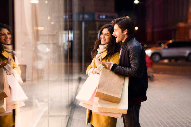 istock Window shopping. Young couple looking at showcase 1178135488