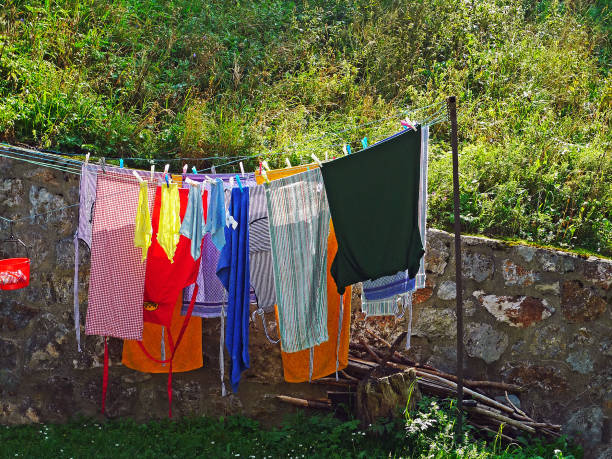istock Village house with washed clothes 1178136251