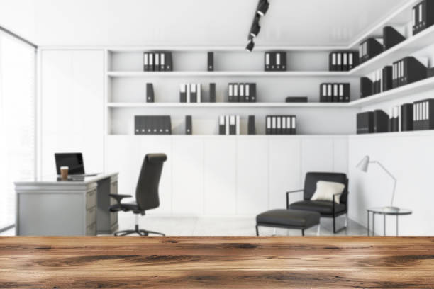 istock Table for product in blurred white CEO office 1178136478