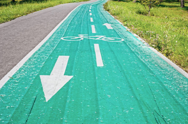 istock Bicycle path in the park at summer 1178138449