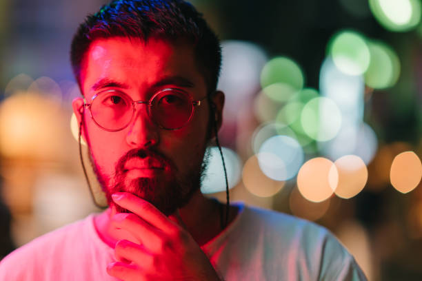 Portrait of young man at night