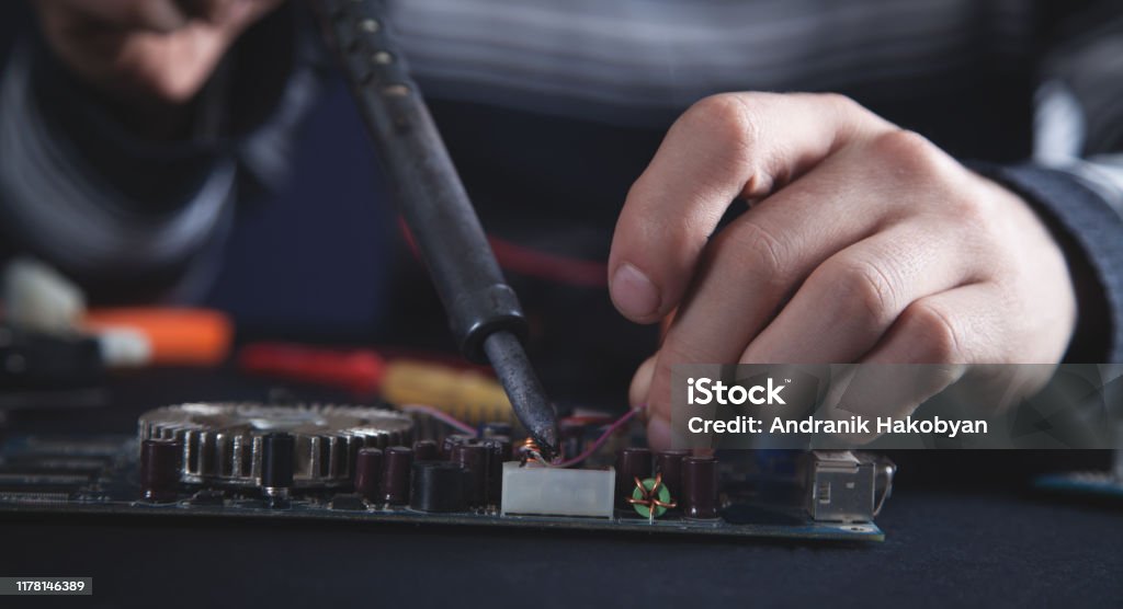 Computer Engineer Motherboard Computer Hardware Engineering Engineer Soldering Computer Motherboard ...