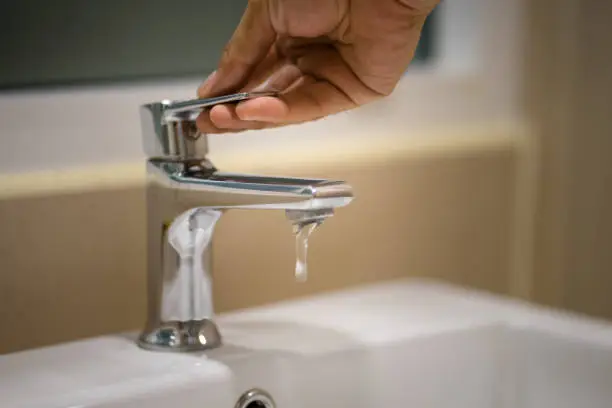 Photo of Turn-off water from faucet.