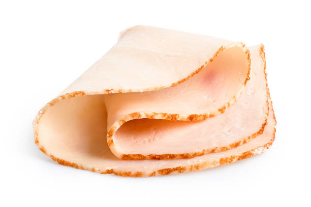 istock A folded single slice of chicken ham isolated on white. 1178152344
