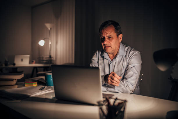 Working Tonight 60+ Serious Tonight Stock Photos, Pictures & Royalty-Free Images - iStock