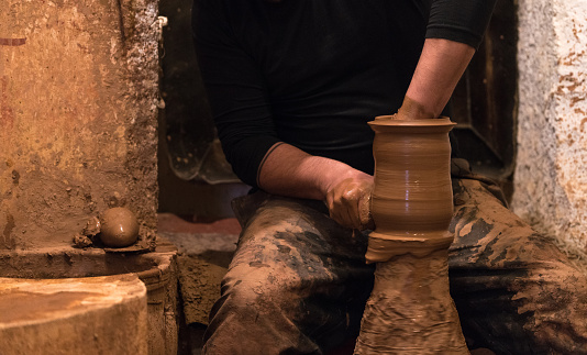 Potter makes pottery handmade