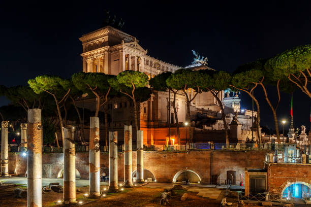 Ancient architectural fragments and Altare della Patria Monumento Nazionale a Vittorio Emanuele II in Rome, Italy