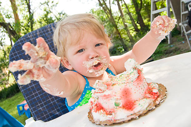 istock Messy Birthday Cake Girl 117815985