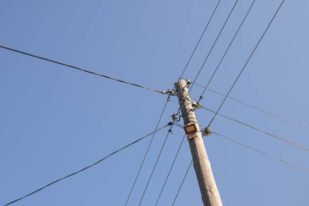 istock electric wood pole on the blur sky background 1178160861