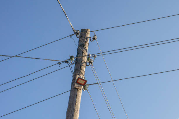 istock electric wood pole on the blur sky background 1178160867