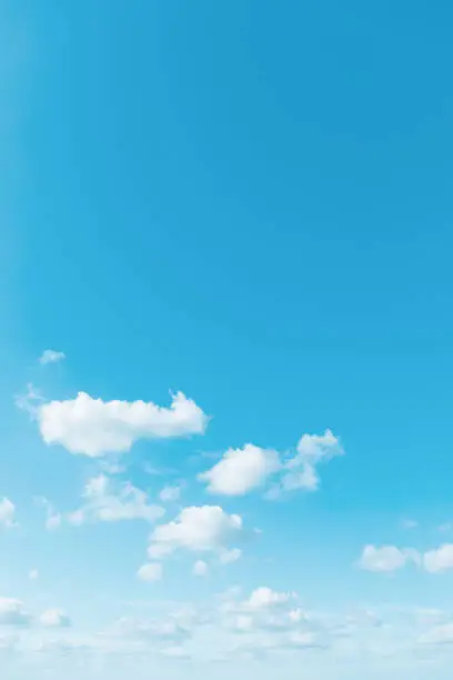 Photo of Blue sky background with cumulus clouds