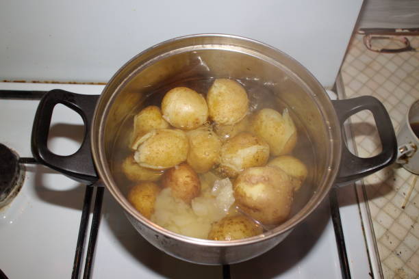 istock potatoes cooked in a pan on the stove 1178161464