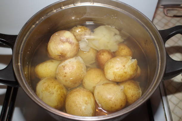 istock potatoes cooked in a pan on the stove 1178161481