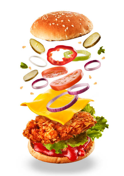 istock Burger with flying ingredients. Delicious monster Hamburger cheeseburger explosion concept flying ingredients 1178162383