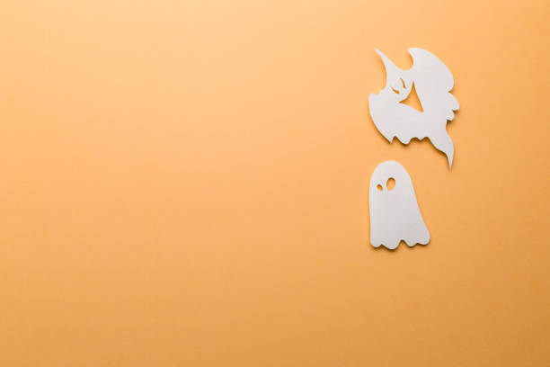 istock Halloween decorations. Halloween paper decorations on orange background. Top view. Flat lay of accessory decoration Halloween festival. Copy space. Minimal creative concept. Pastel colors 1178162441