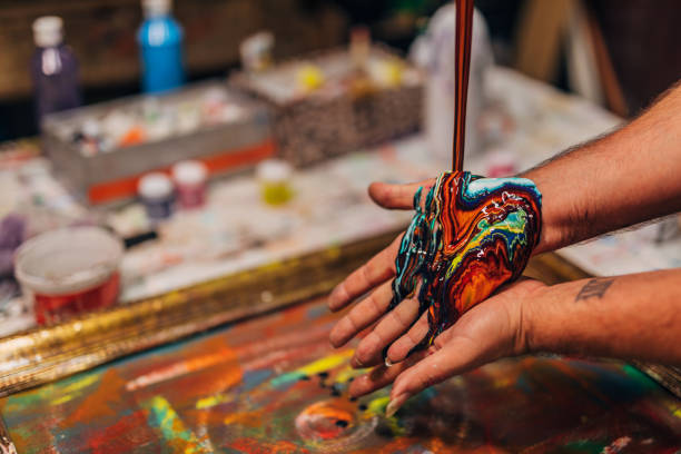 istock Artist pouring colors 1178164211