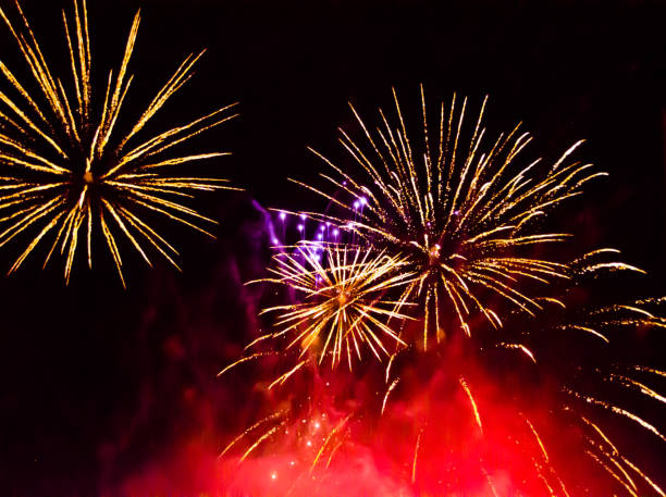 fulminate, colorful, luminous, real  firework at night stock photo