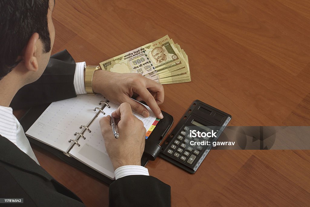 Businessman and His Earnings  Business Stock Photo