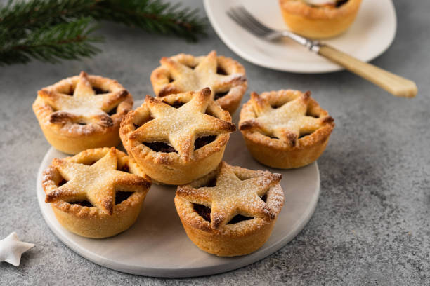 istock Delicious fruit mince tarts for Christmas dinner. Grey background, selective focus 1178167275