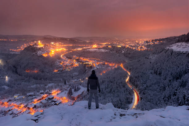Night view from the edge of the cliffs in the winter towards the city of Veliko Turnovo stock photo