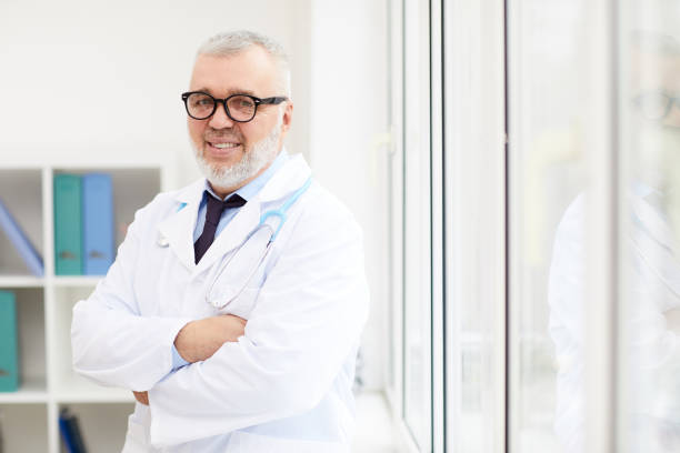 istock Senior medical professional at office 1178172614