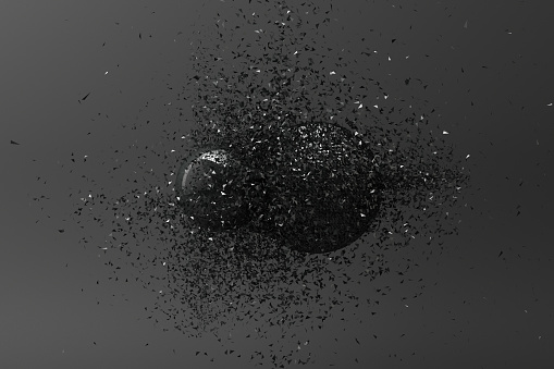 Two balls clashing together resulting in smashed breakup on black background. 3d rendering