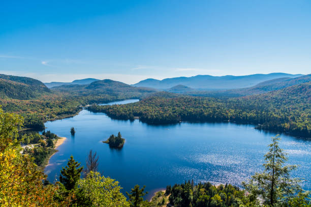 Panoramic view of Mount Tremblant Park and Lake Monroe Panoramic view of Mount Tremblant Park and Lake Monroe quebec stock pictures, royalty-free photos & images