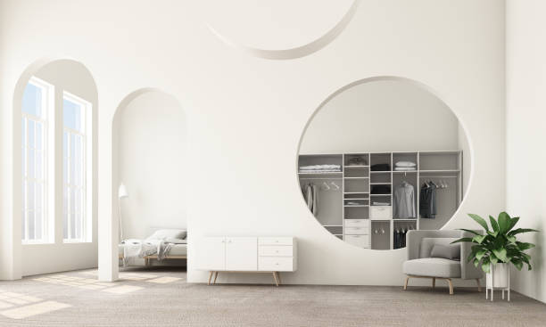 istock Abstract interior design.living area and bedroom with architectural elements in white tone, circular arc, round opening and concrete floor.3d rendering 1178173112