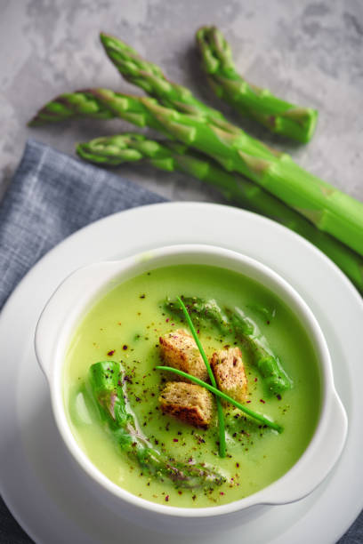 istock Asparagus soup in white bowl 1178174418