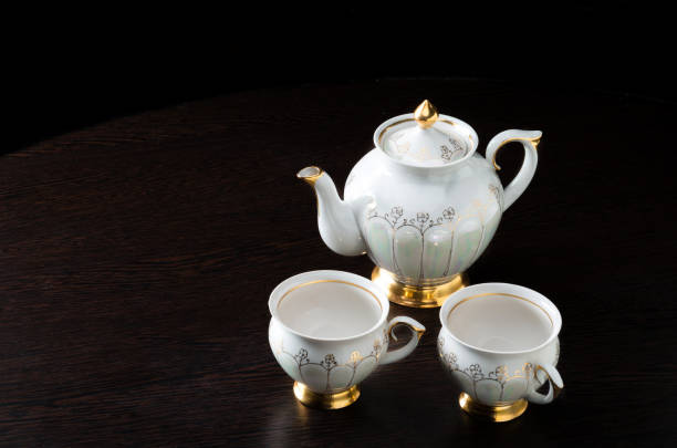 istock Elegant white tea set on dark background 1178174963