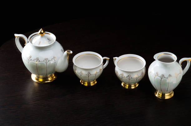 istock Elegant white tea set on dark background 1178174969