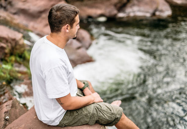 istock Hiker taking a rest at mountain creek 1178175387