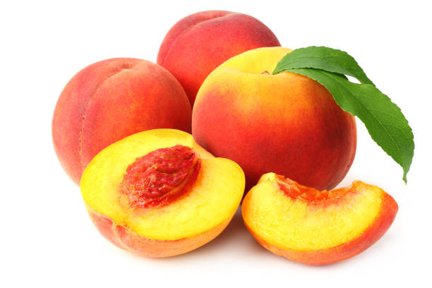 istock peach fruit with green leaves and slices isolated on white background 1178175674