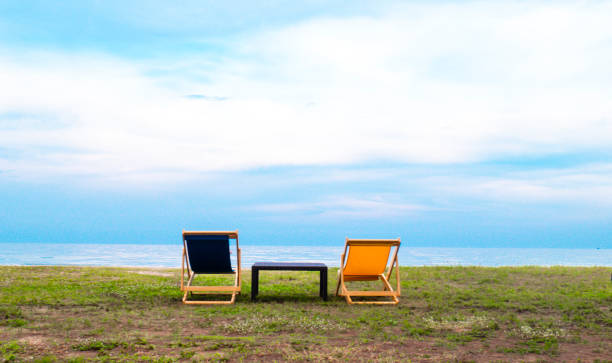 istock Empty Beautiful color deck chairs on the beach coat 1178181645