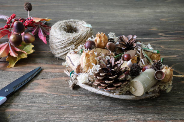istock hand made wreath in a wooden background 1178191718